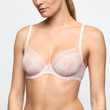 Load image into Gallery viewer, Woman wearing a light pink bra with lace details on a plain background
