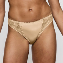Load image into Gallery viewer, Beige lace-trimmed underwear on a neutral background
