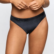 Load image into Gallery viewer, Person wearing black underwear on a plain background
