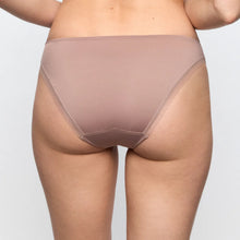 Load image into Gallery viewer, Beige underwear worn by a person on a plain background
