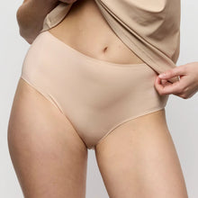 Load image into Gallery viewer, Beige underwear worn by a person on a plain background
