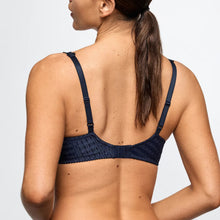 Load image into Gallery viewer, Woman wearing a navy blue bralette on a light gray background
