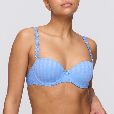 Smooth formed cup underwire balconnet bra with daisy strap detail. This underwire bra may be converted to a halter strap. This bra has the added advantage that it may be used as a halter or crossed over at the back.  Fabric Content: Polyester: 53%, Polyamide: 39%, Elastane: 8%. Santorini Blue.