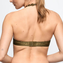 Load image into Gallery viewer, Woman wearing a green lace bralette against a plain background
