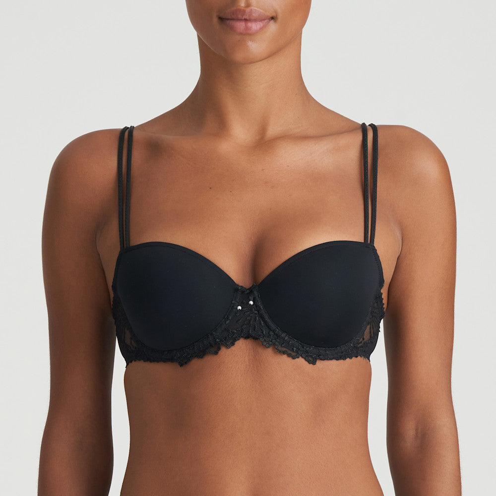 Jane formed and seamless cupped bra with the seductive balconnet neckline. Smooth opaque cups with floral lace trim. The wider wire ensures optimal comfort. Lifts the bust, creating a natural image. Perfect for multiple necklines. B to F cup. Fabric content: Polyamide: 66%, Polyester: 26%, Elastane: 8%. Black.