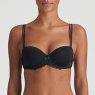Jane formed and seamless cupped bra with the seductive balconnet neckline. Smooth opaque cups with floral lace trim. The wider wire ensures optimal comfort. Lifts the bust, creating a natural image. Perfect for multiple necklines. B to F cup. Fabric content: Polyamide: 66%, Polyester: 26%, Elastane: 8%. Black.
