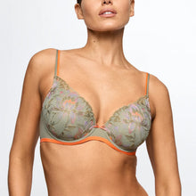 Load image into Gallery viewer, Woman wearing a green floral bra with orange trim on a white background
