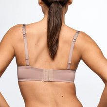 Load image into Gallery viewer, Woman wearing a beige bra against a plain background
