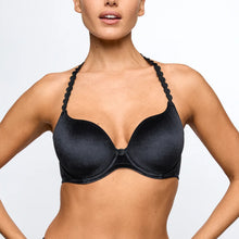 Load image into Gallery viewer, Black bikini top worn by a model on a light gray background
