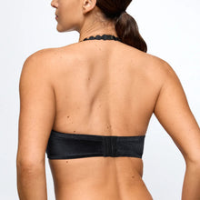 Load image into Gallery viewer, Black bikini top worn by a person on a plain background
