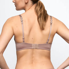 Load image into Gallery viewer, Woman wearing a beige bra against a plain background
