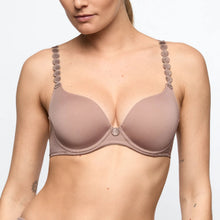 Load image into Gallery viewer, Woman wearing a brown bra with decorative straps on a plain background
