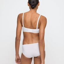 Load image into Gallery viewer, Ivory formed heart shaped underwired bra. The shoulder straps have a playful circular design which can be converted into a halter style. The formed smooth finish of the cup is perfect under T/Shirts.  Fabric Content: Polyester: 38%, Polyamide: 37%, Elastane: 25%

