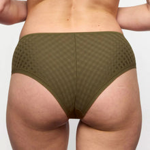 Load image into Gallery viewer, Person wearing green underwear on a plain background
