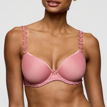 Load image into Gallery viewer, Pink bra with floral straps worn by a model on a plain background
