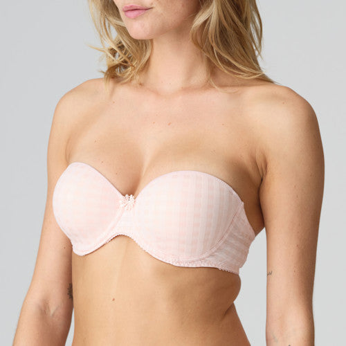 Strapless formed cup underwire bra with a balconnet line. Straight back with silicone strip to give extra support when the bra is worn strapless. Excellent shape and support for those strapless occasions. May also be worn in a halter style. The signature daisy straps complete the picture!  Fabric Content: Polyamide: 49%, Polyester: 41%, Elastane: 10%