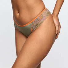 Load image into Gallery viewer, Person wearing a patterned bikini bottom with orange trim on a light gray background
