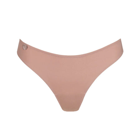 Nude-colored bikini bottom on a white background