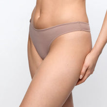 Load image into Gallery viewer, Beige underwear worn by a person on a plain background
