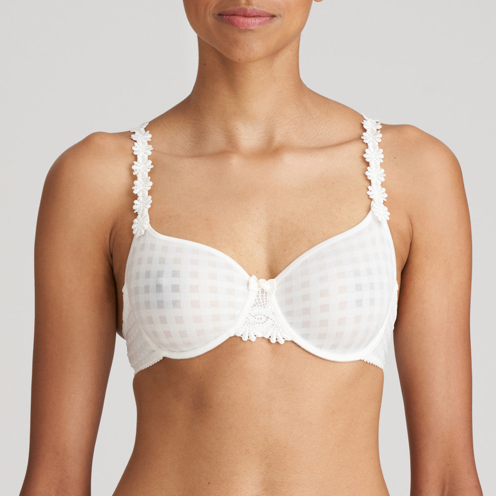 An underwired, non-padded bra. It has the signature Avoro dainty daisy straps, which may be worn as normal or in a halter style. This is the perfect everyday bra. Light and comfortable. Its seamfree cups work perfecly as a t/shirt bra too!   Fabric Content: Polyamide: 79%, Elastane: 17%, Polyester: 4%