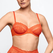 Load image into Gallery viewer, Orange lace bra and panties set on a plain background
