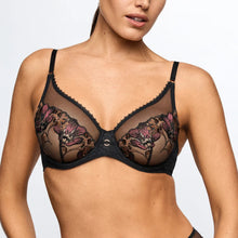 Load image into Gallery viewer, Black lace bra worn by a model on a plain background
