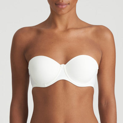 Ivory strapless balconnet underwired bra. The shoulder straps have a playful circular design which can be converted into a halter style. The formed smooth finish of the cup is perfect under T/Shirts. Perfect for strapless or normal wear.  Fabric Content: Polyamide: 39%, Polyester: 35%, Elastane: 26%