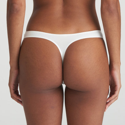 Ivory classic G/String made from diaphanous fabric with a seamless finish. Perfect smoothness under any garment.  Fabric Content: Polyamide: 78%, Elastane:13%, Cotton: 9%