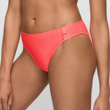 Load image into Gallery viewer, Person wearing bright pink high-waisted bikini bottoms on a light gray background
