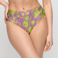 Purple and green floral-patterned underwear on a plain background