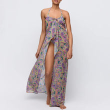 Load image into Gallery viewer, Woman wearing a colorful patterned dress on a white background
