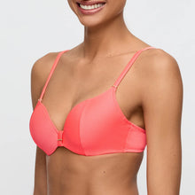 Load image into Gallery viewer, Woman wearing a pink bikini top against a plain background
