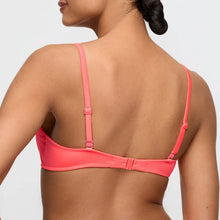 Load image into Gallery viewer, Pink bikini top worn by a person on a plain background
