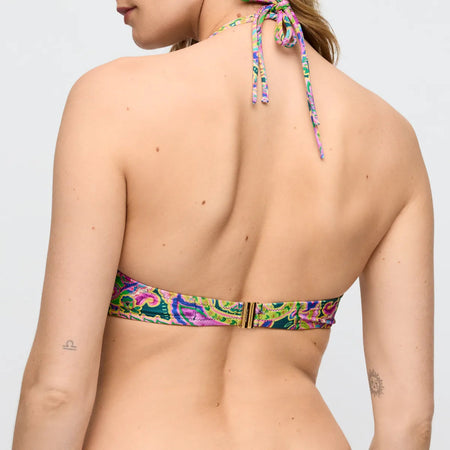 Multicolored bikini top on a plain background