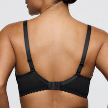 Load image into Gallery viewer, Black bra worn by a person on a light gray background
