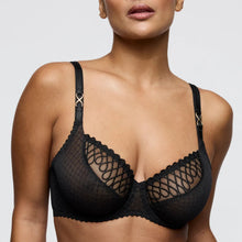 Load image into Gallery viewer, Black lace bra worn by a model on a plain background
