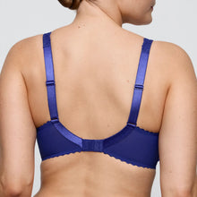 Load image into Gallery viewer, Blue bra worn by a person on a plain background
