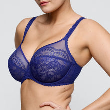 Load image into Gallery viewer, Blue lace bra on a plain background
