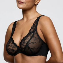 Load image into Gallery viewer, Black lace bra worn by a model on a plain background
