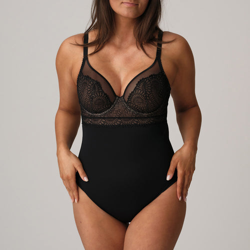 Black. This body is simply irresistible. It is elegant with the look of a bustier style long line bra. The plunge mesh gives the illusion of lightness but offers full support. The flowered embroidery lace has an edgy tattoo effect.  Fabric: Polyamide: 56%, Elastane: 33%, Polyester: 9%, Cotton: 2%