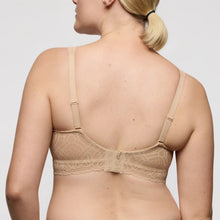 Load image into Gallery viewer, Beige bra worn by a model on a plain background
