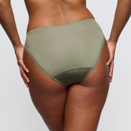 Person wearing olive green underwear on a plain background