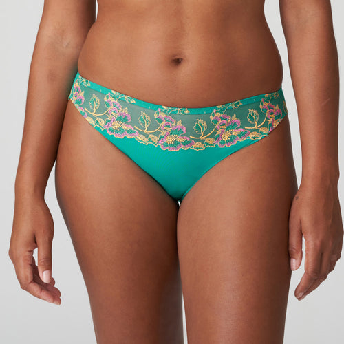 These bikini-style rio briefs are made of soft microfiber. They have a luxurious embroidery in a contrasting colours. Sunny Teal is a tropical shade of green with ochre and fuchsia highlights. Looks great on both pale and dark skin.  Fabric: Polyamide: 67%, Elastane:15%, Polyester:10%, Cotton: 8%