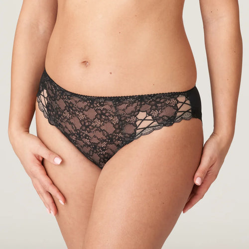 Stylish bikini style Rio briefs in a smooth fabric with sexy laser cut-outs at the legs. Delicate elastic trim at the bottom for an invisible fit. Both flattering and practical.  Fabric Content: Polyamide: 73%, Elastane:18%, Cotton: 9%