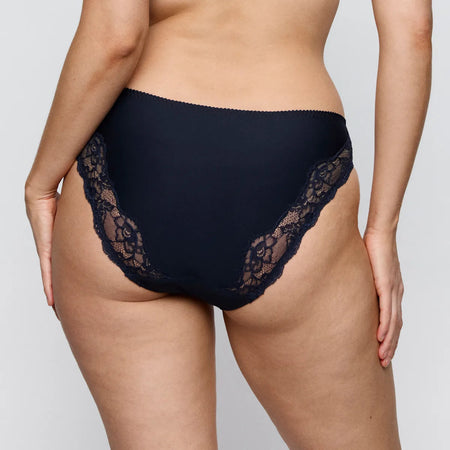Black lace underwear on a plain background