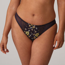 Load image into Gallery viewer, A Rio brief that offers full coverage at the back. It has an elegant cut at the legs in front with a lovely floral detail. Amethyst is a surprising blend of chartreuse embroidery set off by baby blue highlights and a hue of aubergine. Glitter details capture the sunlight and bring the floral pattern even more prominently to the foreground.
