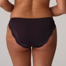 Load image into Gallery viewer, A Rio brief that offers full coverage at the back. It has an elegant cut at the legs in front with a lovely floral detail. Amethyst is a surprising blend of chartreuse embroidery set off by baby blue highlights and a hue of aubergine. Glitter details capture the sunlight and bring the floral pattern even more prominently to the foreground.
