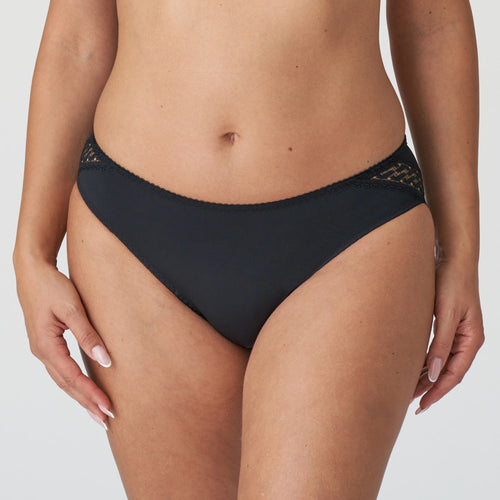 Opaque briefs with chic lace embroidery on the hip. Full back for coverage with a lace trim seam free finish.   Fabric: Polyamide: 87%, Elastane: 11%, Cotton: 2%. Black.