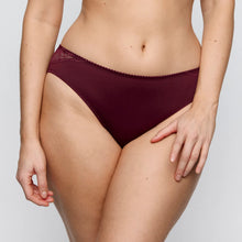 Load image into Gallery viewer, Maroon underwear worn by a person on a light gray background
