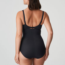Load image into Gallery viewer, Elegant super figure-fixing panty girdle with a smart, smooth look. Worn just below the bra. It shapes tummy and waist to create a slim, flowing figure. The smooth finish over the stomach ensures it does not show under clothing. Its superior design guarantees that it does not roll down!  Fabric content: Polyamide: 59%, Elastane: 39%, Cotton: 2%. Black.
